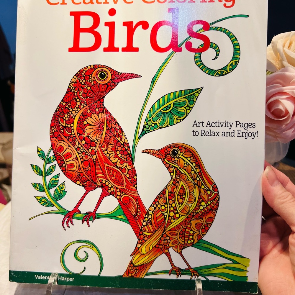 Creative Coloring Birds Book with coloring tips and sample pages.